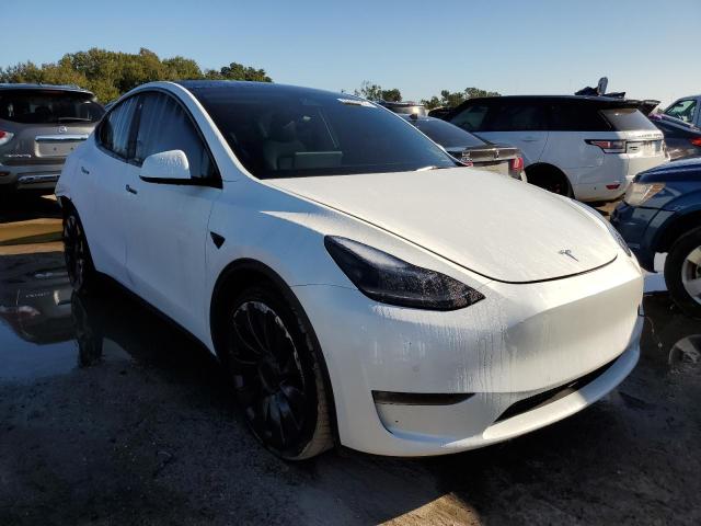 TESLA MODEL Y 2022 with VIN 7SAYGDEF5NF327458 - Photo from auction