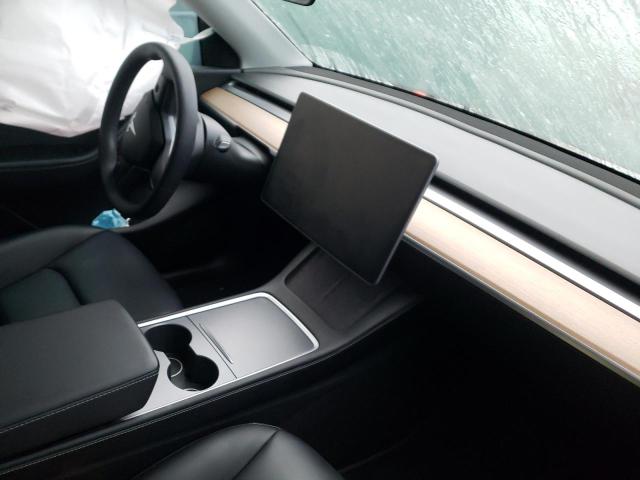 Photo 8 from auction – 2021 TESLA MODEL Y with VIN 5YJYGDEE2MF257551