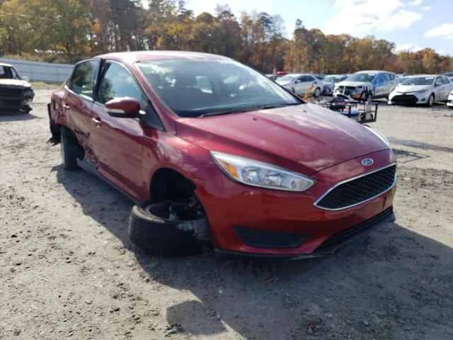 FORD FOCUS SE 2017 with VIN 1FADP3F21HL326946 - Photo from auction