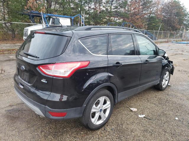 Photo 4 from auction – 2016 FORD ESCAPE SE with VIN 1FMCU9GX2GUB91024
