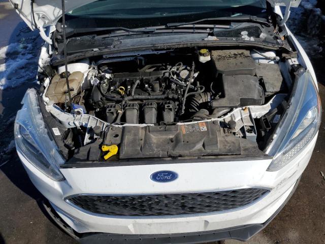 Foto 7 de la subasta – 2017 FORD FOCUS SE con VIN 1FADP3K23HL271602