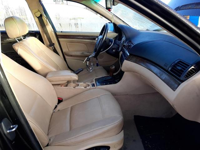 Photo 5 from auction – 2004 BMW 325I with VIN WBAET37474NJ45291