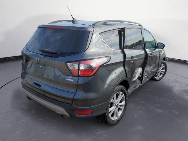 Photo 4 from auction – 2018 FORD ESCAPE SE with VIN 1FMCU0GD3JUD27895