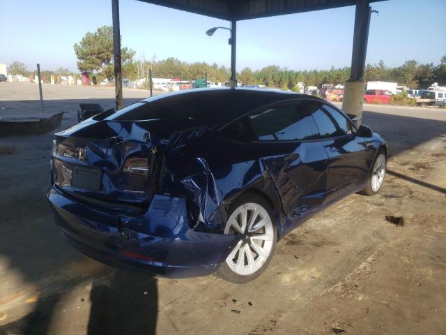 Photo 4 from auction – 2021 TESLA MODEL 3 with VIN 5YJ3E1EB7MF050741