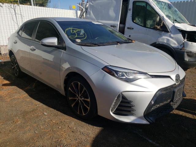 TOYOTA COROLLA L 2018 with VIN 2T1BURHE9JC008431 - Photo from auction