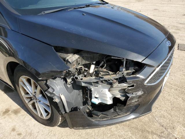 Photo 9 from auction – 2015 FORD FOCUS SE with VIN 1FADP3F24FL355564