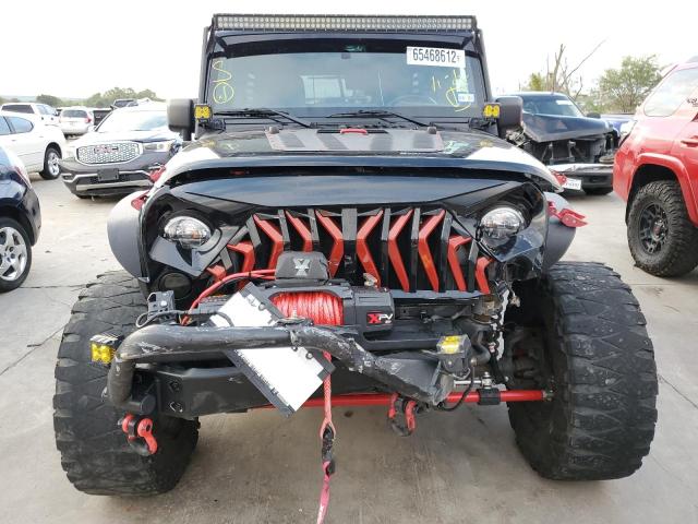 Photo 5 from auction – 2011 JEEP WRANGLER U with VIN 1J4HA5H12BL501431