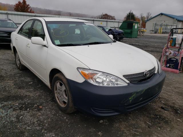 TOYOTA CAMRY LE 2002 with VIN 4T1BF32K32U034822 - Photo from auction