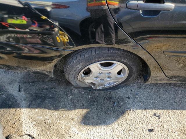 Photo 9 from auction – 2003 TOYOTA CAMRY LE with VIN 4T1BF32KX3U040635