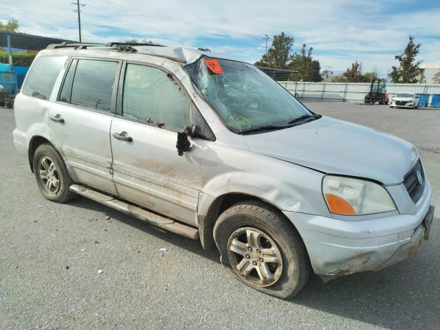 Photo 9 from auction – 2003 HONDA PILOT EX with VIN 2HKYF18463H571059