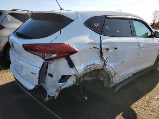 Photo 9 from auction – 2018 HYUNDAI TUCSON SE with VIN KM8J2CA41JU675864