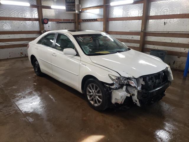 TOYOTA CAMRY HYBR 2011 with VIN 4T1BB3EKXBU137663 - Photo from auction