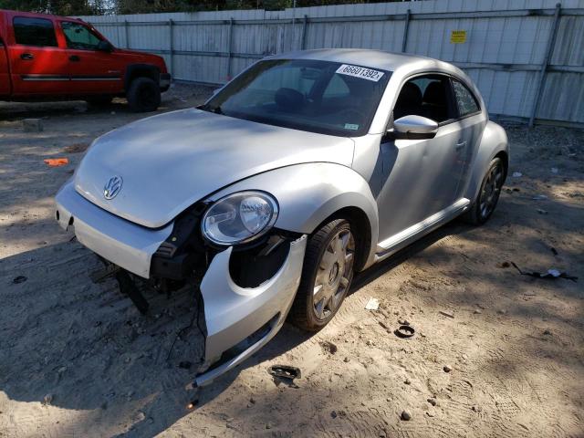 Photo 2 from auction – 2012 VOLKSWAGEN BEETLE with VIN 3VWJP7AT7CM604354