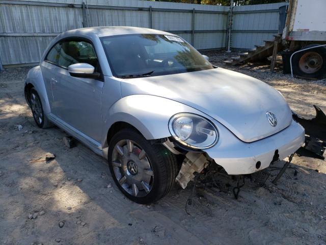 VOLKSWAGEN BEETLE 2012 with VIN 3VWJP7AT7CM604354 - Photo from auction
