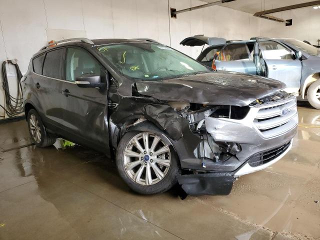 FORD ESCAPE TIT 2017 with VIN 1FMCU9J93HUC77289 - Photo from auction