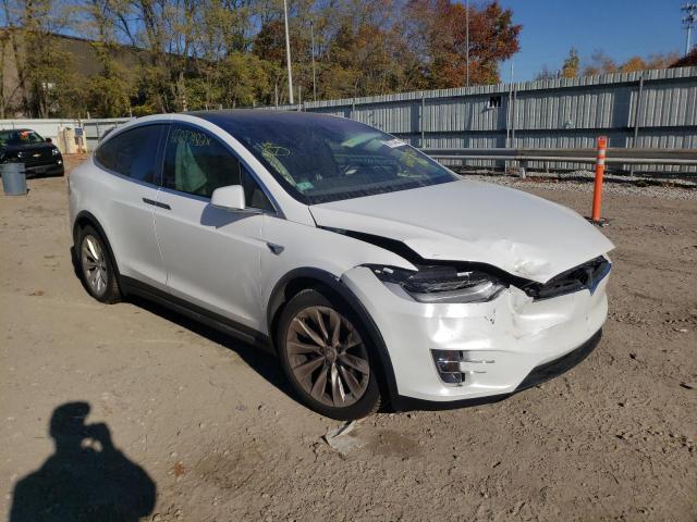 TESLA MODEL X 2016 with VIN 5YJXCBE25GF028299 - Photo from auction