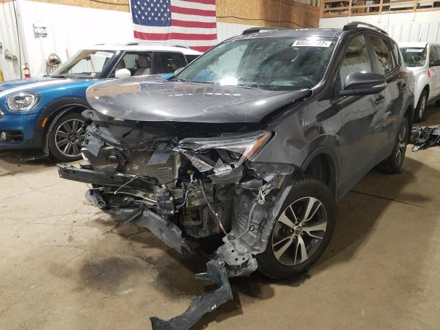 Photo 2 from auction – 2017 TOYOTA RAV4 XLE with VIN 2T3RFREV7HW618390