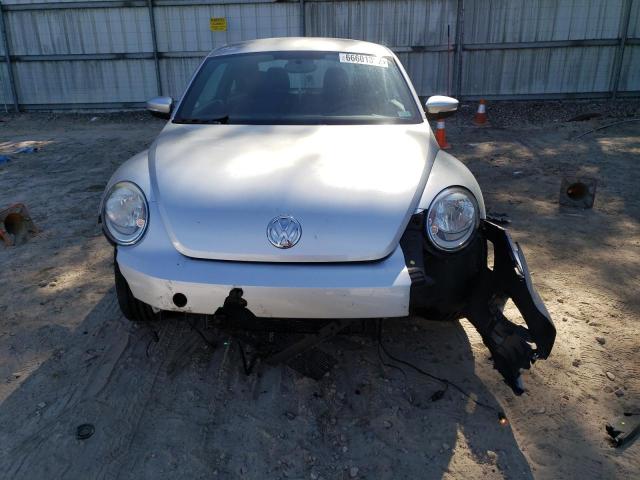 Photo 9 from auction – 2012 VOLKSWAGEN BEETLE with VIN 3VWJP7AT7CM604354