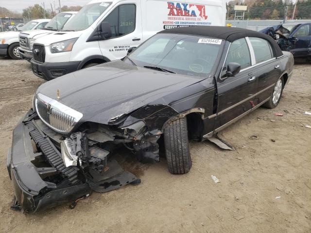 Photo 2 from auction – 2003 LINCOLN TOWN CAR E with VIN 1LNHM81W23Y650202