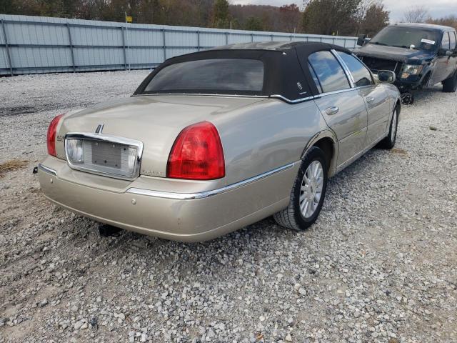 Photo 4 from auction – 2004 LINCOLN TOWN CAR E with VIN 1LNHM81WX4Y644391