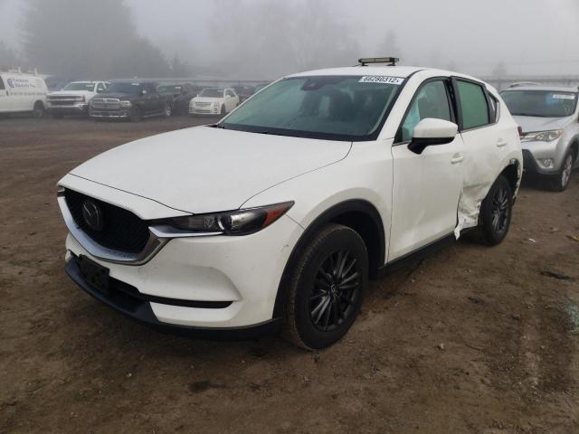 Photo 2 from auction – 2021 MAZDA CX-5 SPORT with VIN JM3KFBBM9M0347911