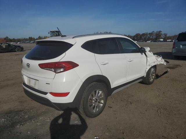 Photo 4 from auction – 2017 HYUNDAI TUCSON LIM with VIN KM8J3CA48HU442037