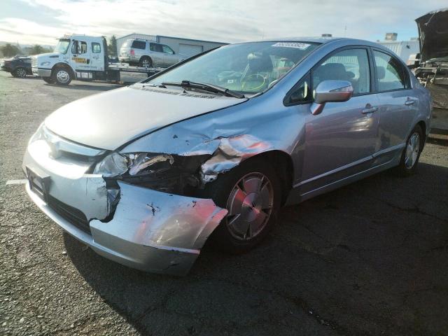 Photo 2 from auction – 2006 HONDA CIVIC HYBR with VIN JHMFA36206S009648