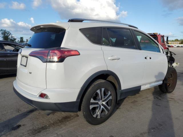 Photo 4 from auction – 2017 TOYOTA RAV4 LE with VIN JTMZFREV3HJ717397