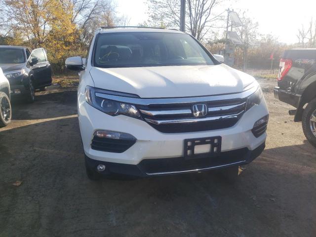 Photo 9 from auction – 2018 HONDA PILOT ELIT with VIN 5FNYF6H04JB019534