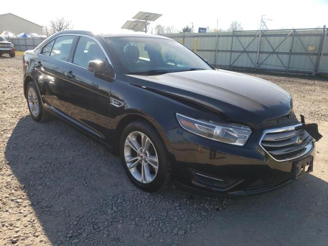 FORD TAURUS SEL 2015 with VIN 1FAHP2E84FG173986 - Photo from auction