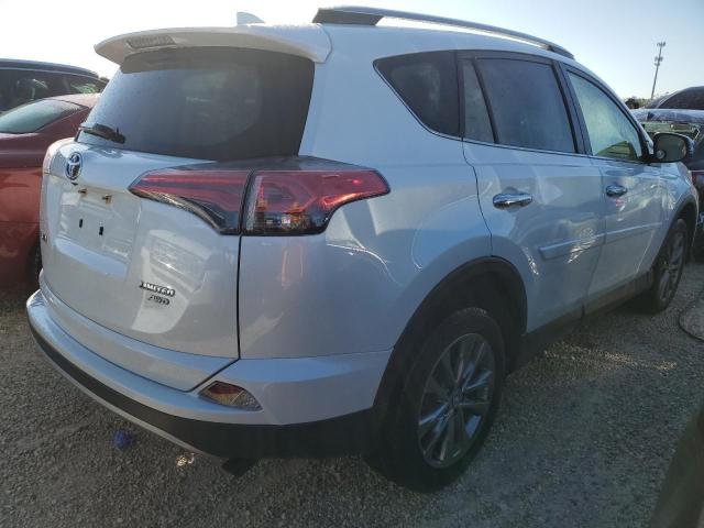 Photo 4 from auction – 2018 TOYOTA RAV4 LIMIT with VIN JTMDFREVXJJ188207