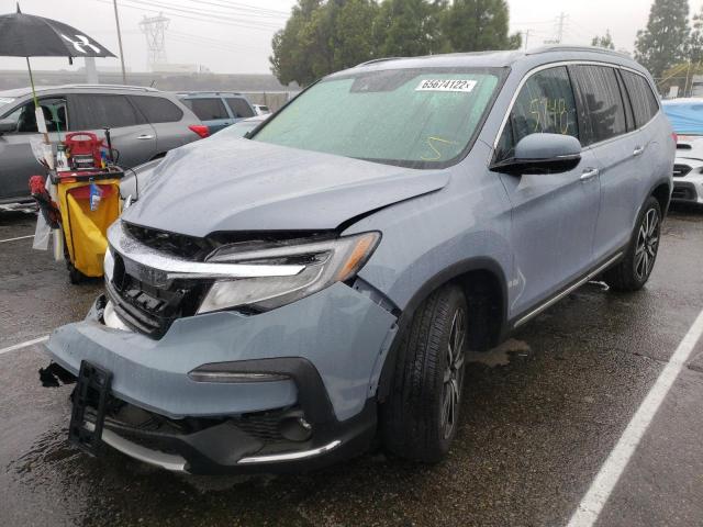 Photo 2 from auction – 2022 HONDA PILOT TOUR with VIN 5FNYF5H64NB020249