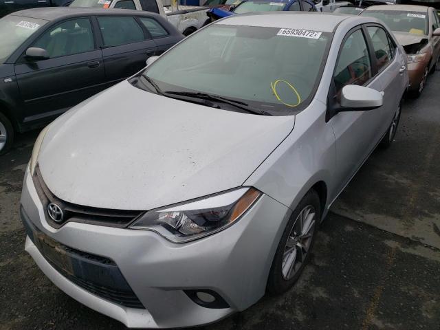 Photo 2 from auction – 2014 TOYOTA COROLLA L with VIN 5YFBURHE2EP015095