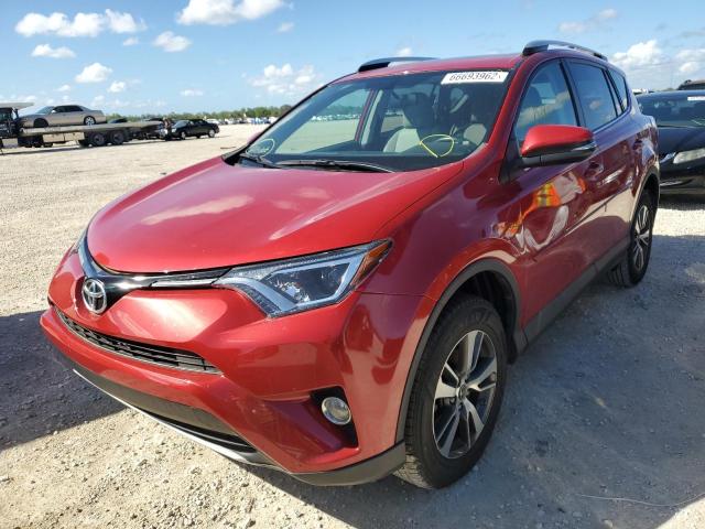 Photo 2 from auction – 2016 TOYOTA RAV4 XLE with VIN 2T3WFREV6GW259096