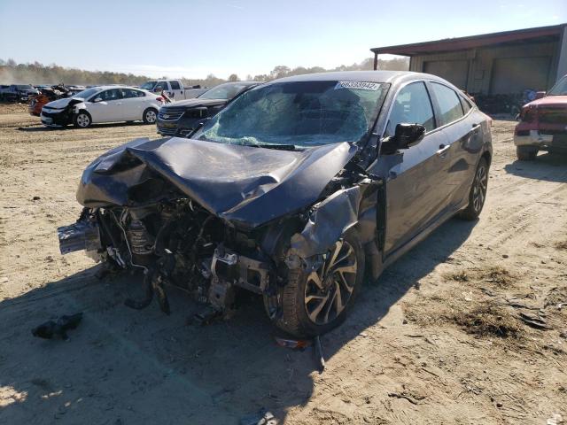 Photo 2 from auction – 2018 HONDA CIVIC EX with VIN 2HGFC2F73JH599380