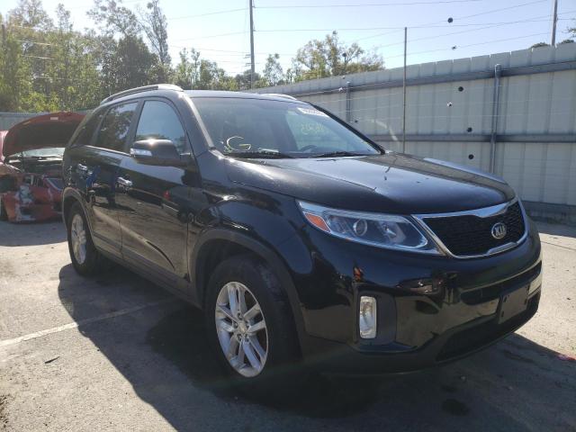 KIA SORENTO LX 2014 with VIN 5XYKT3A69EG464863 - Photo from auction
