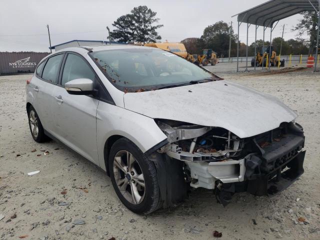 FORD FOCUS SE 2014 with VIN 1FADP3K20EL163496 - Photo from auction