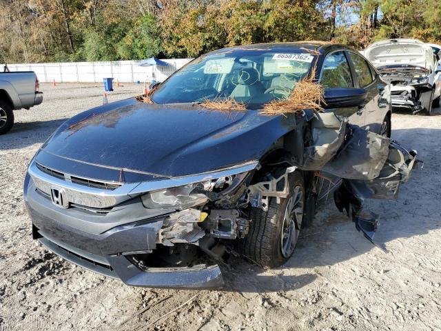 Photo 2 from auction – 2016 HONDA CIVIC EX with VIN 19XFC2F73GE003851