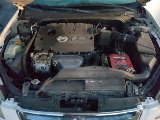 Photo 11 from auction – 2002 NISSAN ALTIMA with VIN 1N4AL11D42C190699