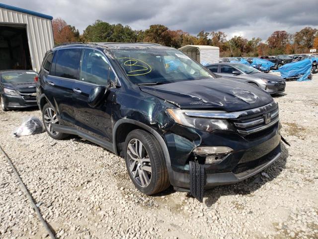 HONDA PILOT TOUR 2016 with VIN 5FNYF5H93GB009773 - Photo from auction