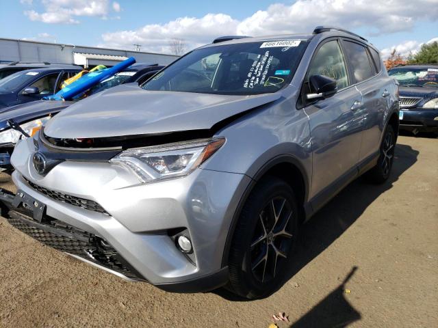 Photo 2 from auction – 2018 TOYOTA RAV4 SE with VIN JTMJFREV1JD249722