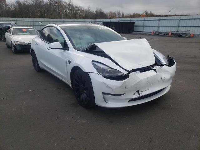 TESLA MODEL 3 2021 with VIN 5YJ3E1EC7MF063434 - Photo from auction