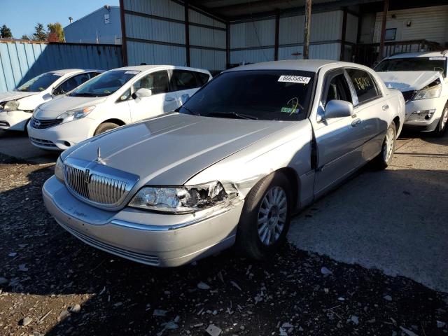 Photo 2 from auction – 2004 LINCOLN TOWN CAR E with VIN 1LNHM81WX4Y675219