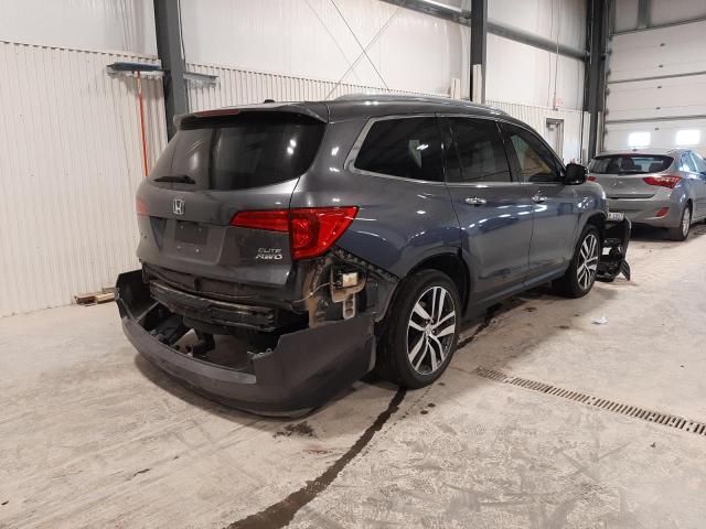 Photo 4 from auction – 2016 HONDA PILOT ELIT with VIN 5FNYF6H0XGB076331
