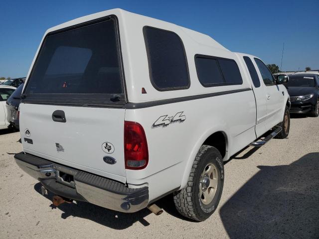 Photo 4 from auction – 2001 FORD F150 with VIN 1FTRX18L11NA75947