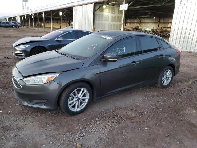FORD FOCUS SE 2017 with VIN 1FADP3F24HL230647 - Photo from auction