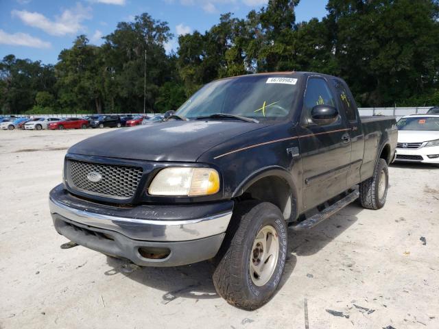 Photo 2 from auction – 2000 FORD F-150 with VIN 1FTRX18L7YNC30978