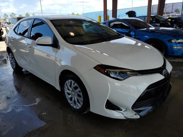 TOYOTA COROLLA L 2017 with VIN 5YFBURHE9HP700117 - Photo from auction