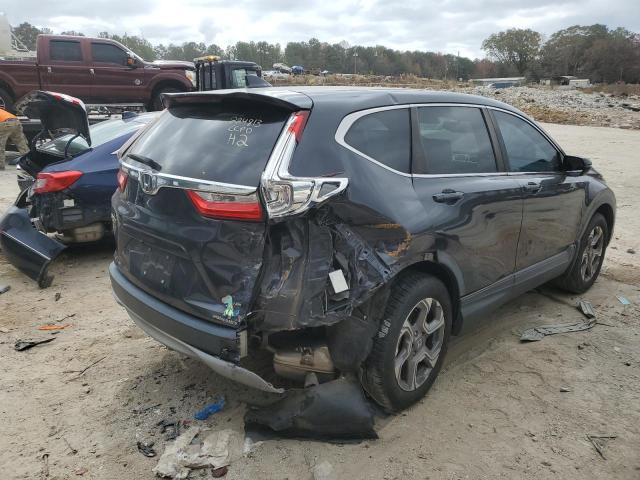 Photo 4 from auction – 2017 HONDA CR-V with VIN 7FARW1H81HE007577