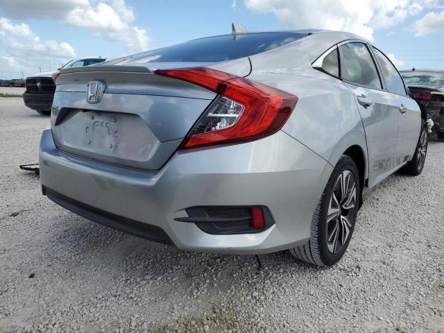 Photo 4 from auction – 2018 HONDA CIVIC EX with VIN JHMFC1F39JX003463